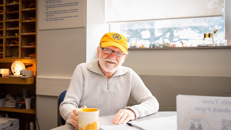 Russ Petricka sitting in the Math Skills Center.