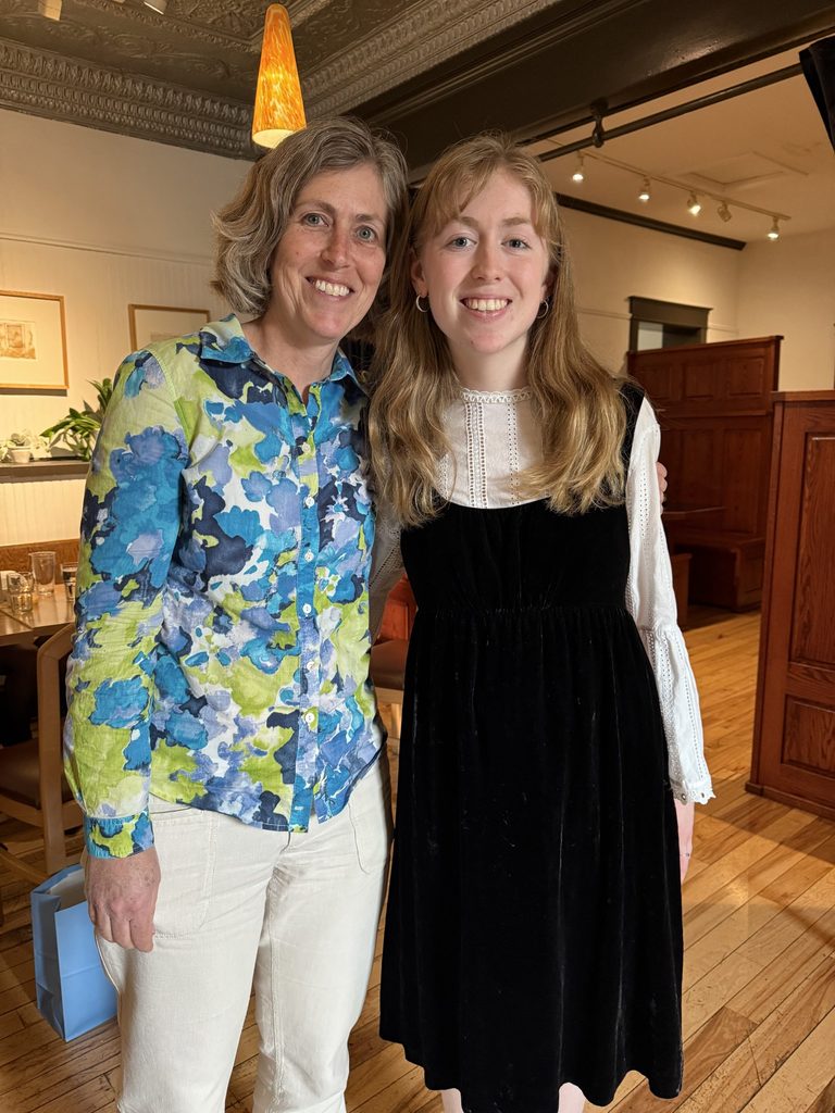 Diane Mancini ’94 and Elsa Snowbeck ’25 pose together at the Ole Store.