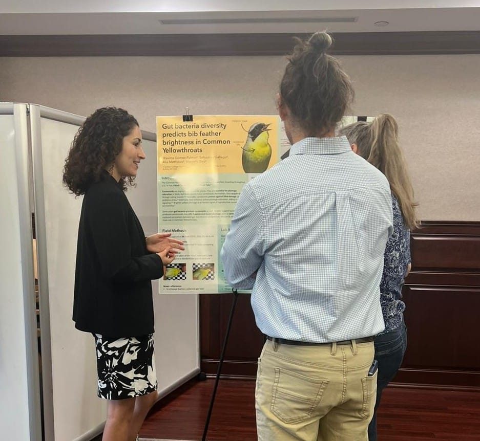 Maxima presenting her poster at the Buffalo Research Symposium.