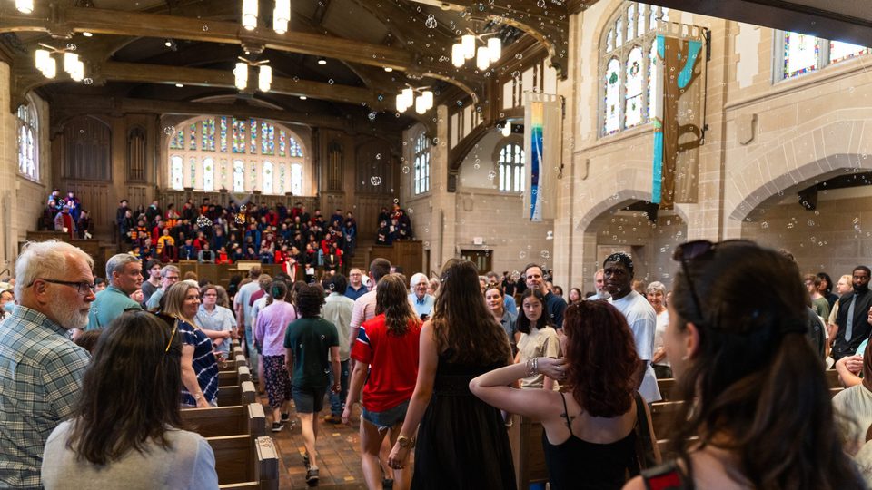 Bubbles floating down on Honors Convo honorees as they process into the Chapel.