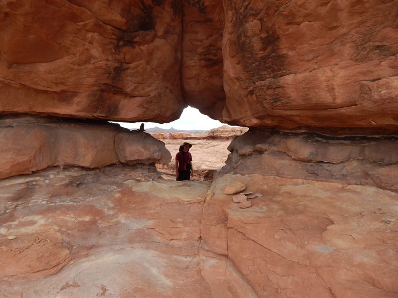 Mike Hellman '17 at Peekaboo Arch.