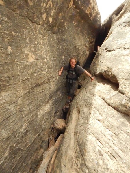 Dustin Michels '18 navigating a narrow section of the trail.