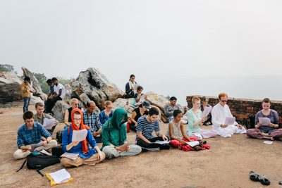 Students studying on a mountain top