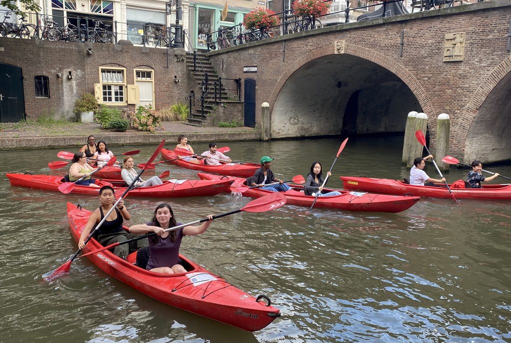 Students in red kayaks