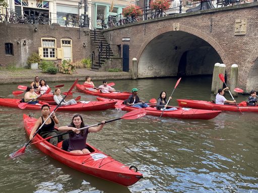 Students in red kayaks