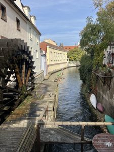 Canal in Prague with paddle wheel