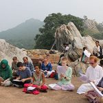 Students study on various rock formations