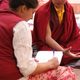 Student interviews a monk
