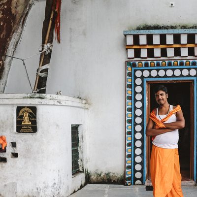 Man standing in front of a painted door frame
