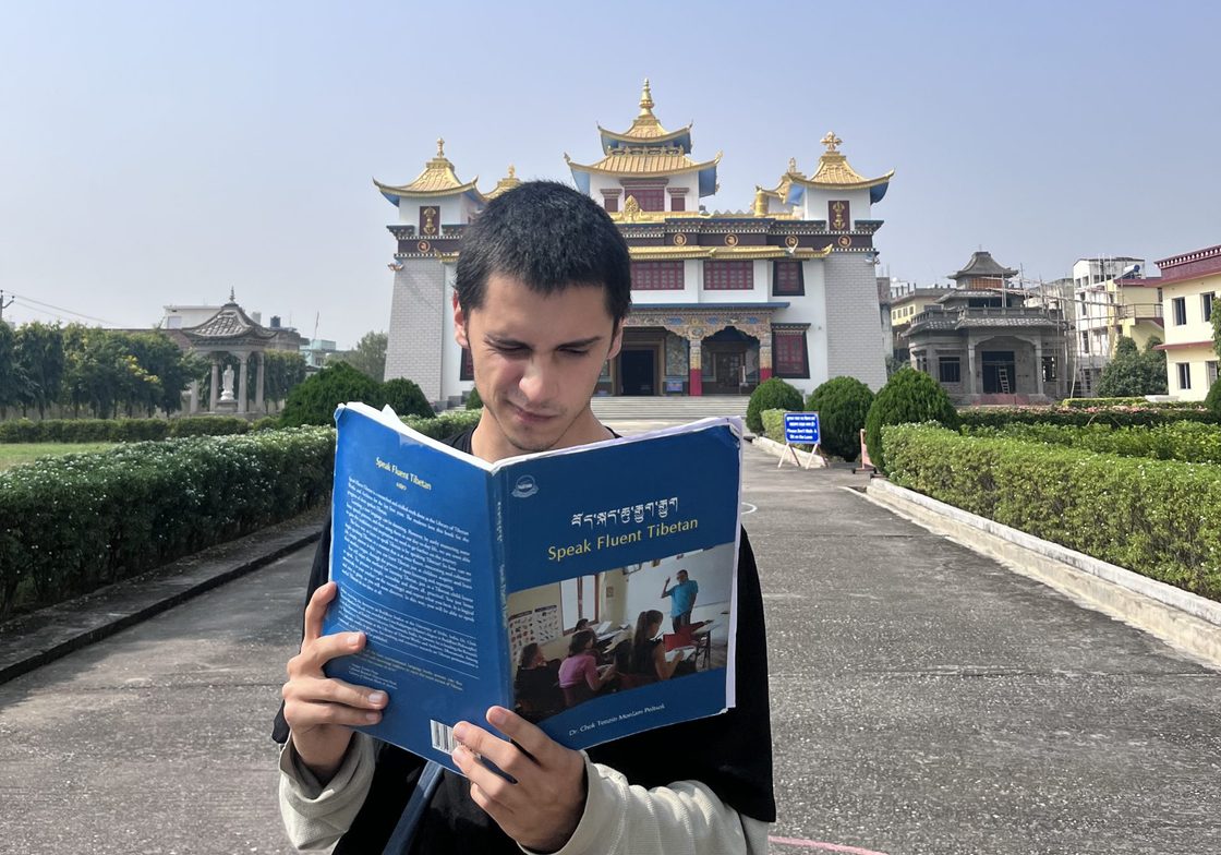 Studying the homework for Tibetan language class 