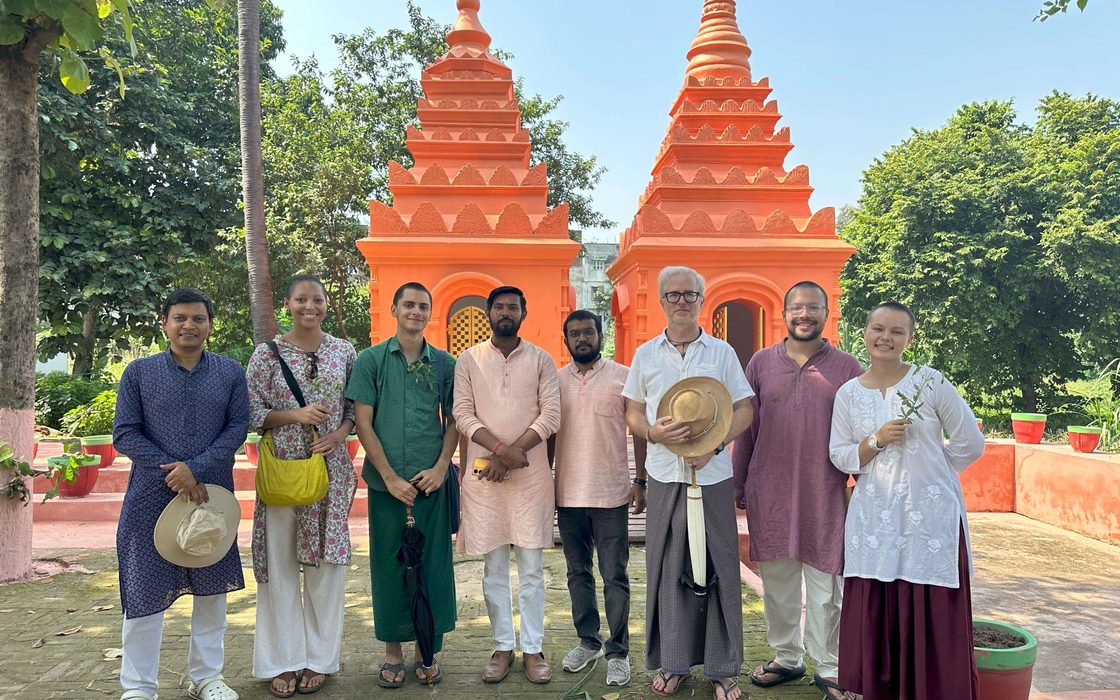BSIN faculty and staff in front of monuments