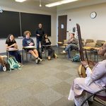 Wassa Kouyate plays a kora for French class