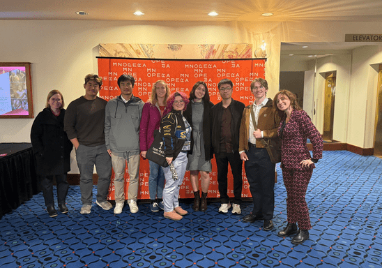 French students pose at opera event