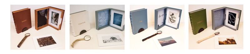 Leather portfolios containing photographs