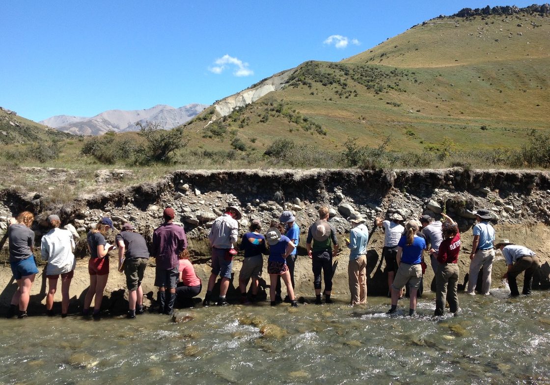 Students Looking at a Mountain in New Zealand