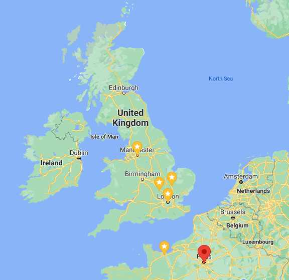 Map of UK with Manchester, Cambridge, Bletchley Park and London starred, Also Caen and Paris, France