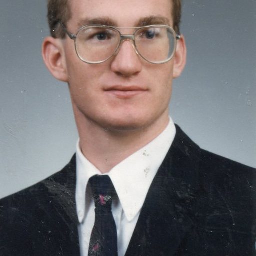 Archival photo of John Higgins (1995)