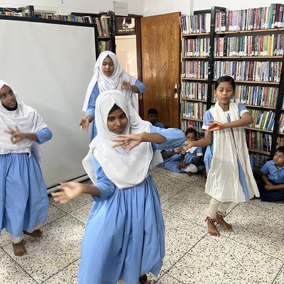 people dancing in classroom