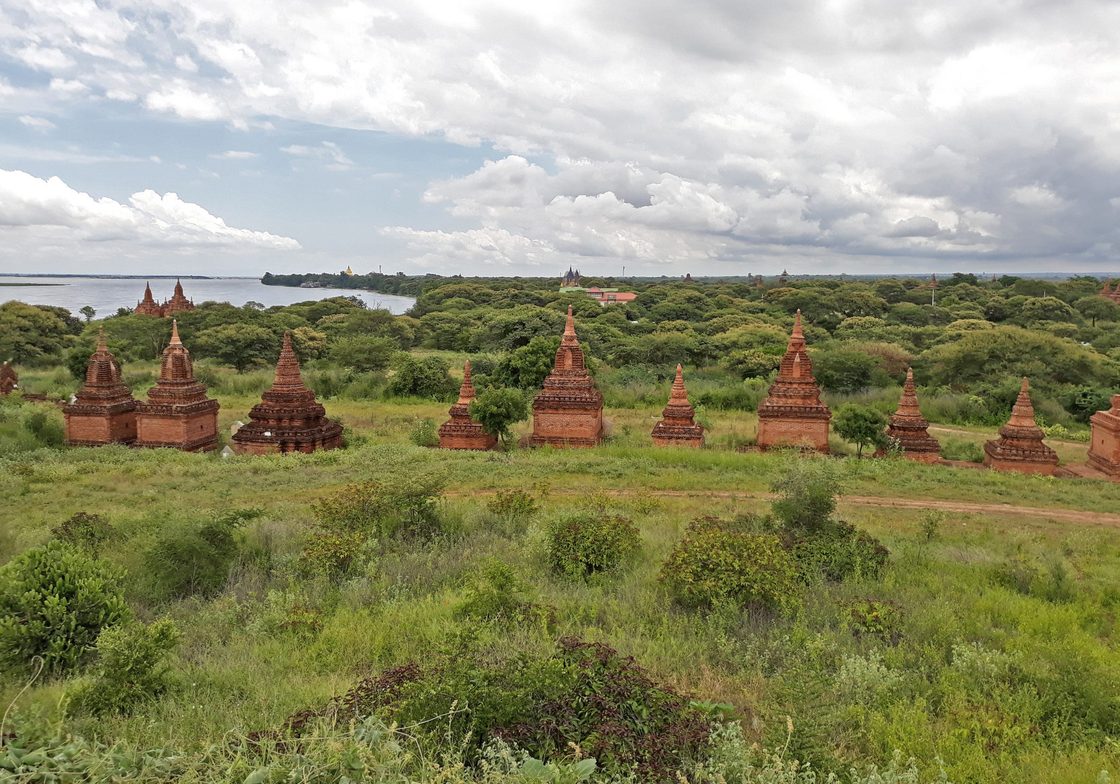 Stupas in a field in Southeast Asia