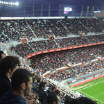 Students Watching a Soccer Match in Seville
