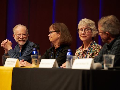 Reunion 2026 speakers at an Alumni College presentation