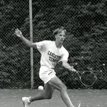 Carleton tennis player Tom James '89 returns the ball at a game during during 1987-1988.