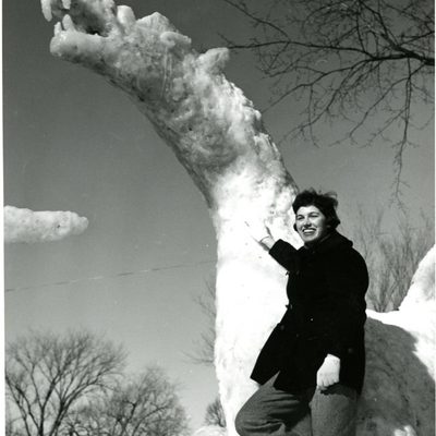 Knight and dragon snow sculpture, 1960. Student is Carole Pushing '61.