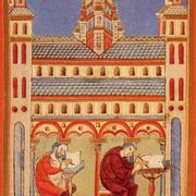a medieval illustration of a monk and a lay person making books