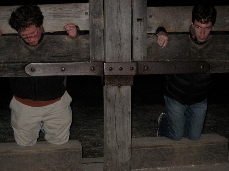 Students Posing in a Wooden Guillotine