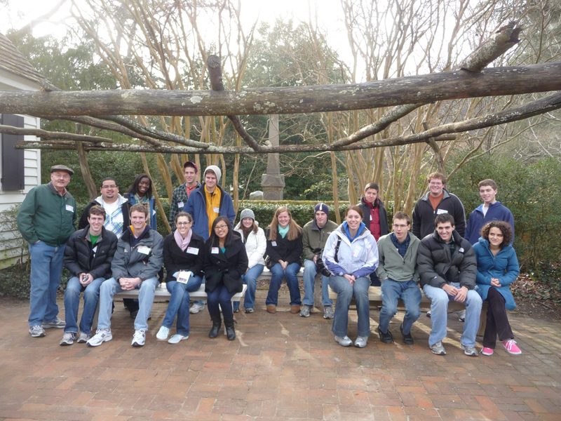 Group Photo Under Wooden Structure