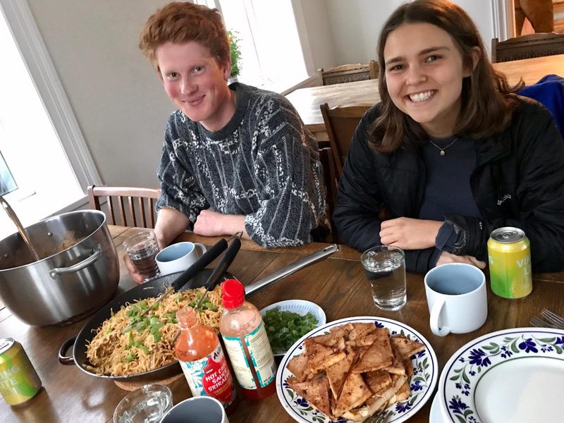Carleton students enjoy an Icelandic Dinner, Raven Dawson '22 and Tali Emlen '22 Eating Dinner in Dalvík, Northern Iceland