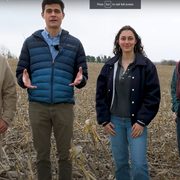 Professor Dan Maxbauer and students in research field