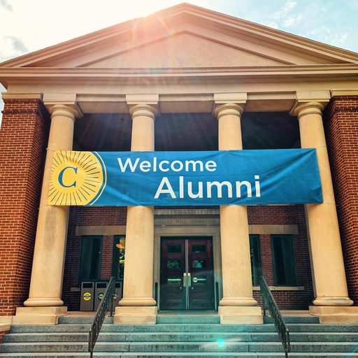 Sayles-Hill featuring a Welcome Alumni sign.