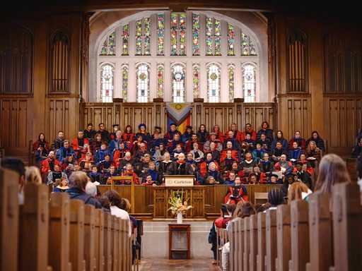 aisle view in skinner chapel facing seated faculty