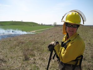 Nancy Braker at a prescribed burn at McKnight Prairie