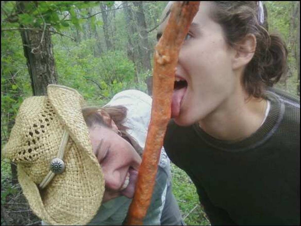 Chelsea Clifford '10 and Callie Millington '12 with slime mold.