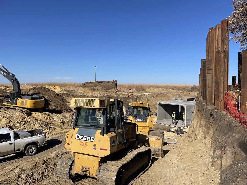 Construction machinery at a dig/work site on the edge of Arboretum Prairie.