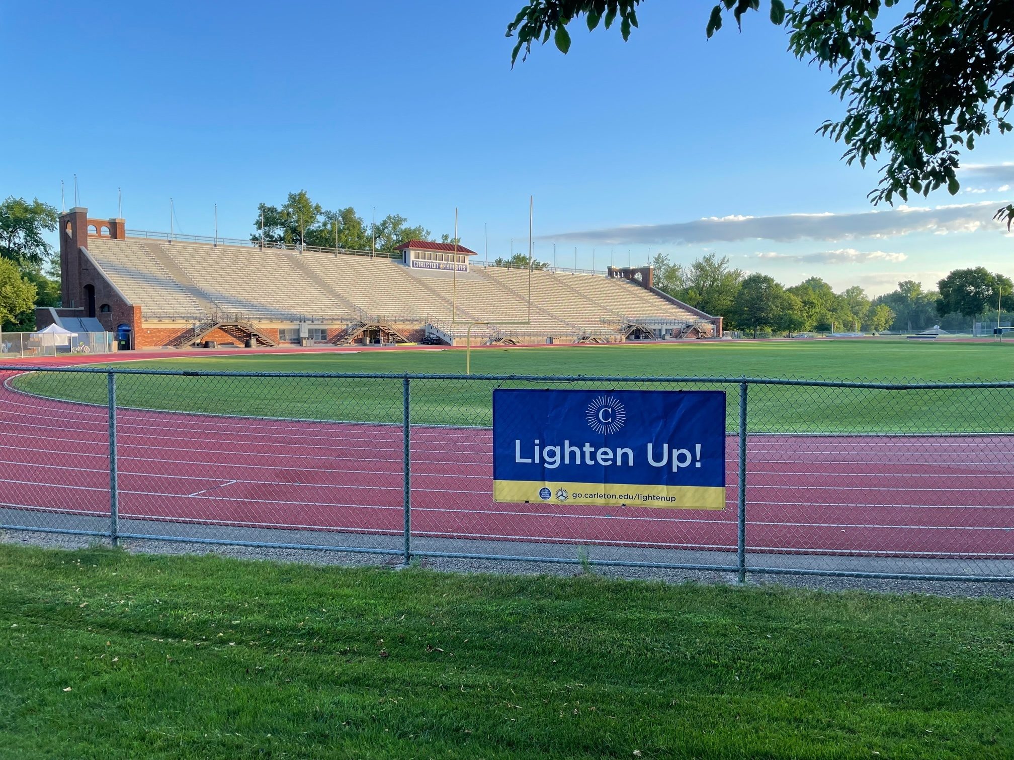 Laird Stadium at Carleton College with Lighten Up! Sign