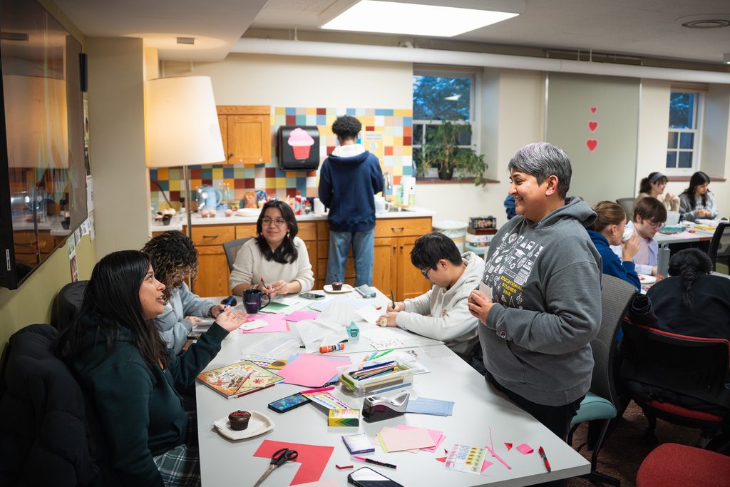 students doing crafts around a table