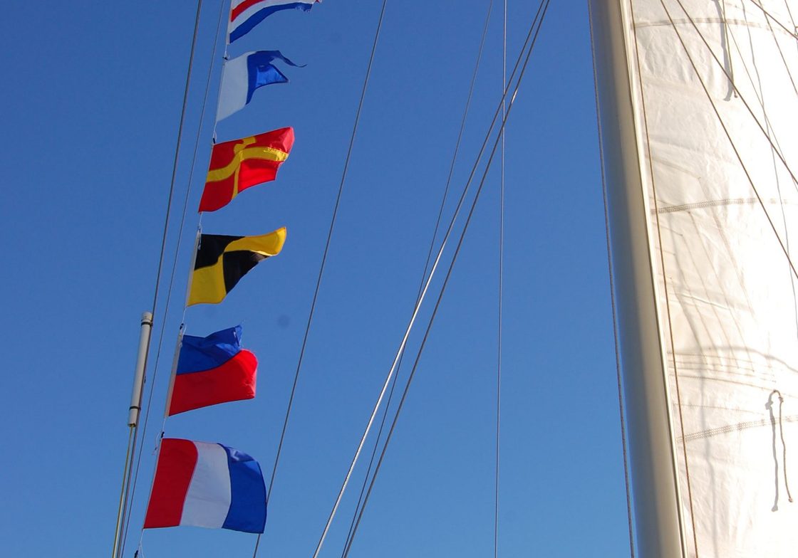 Baja Schooner flags on mast
