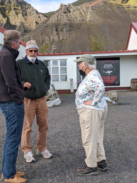 3 people having a discussion