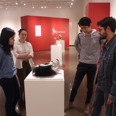 students looking at artworks