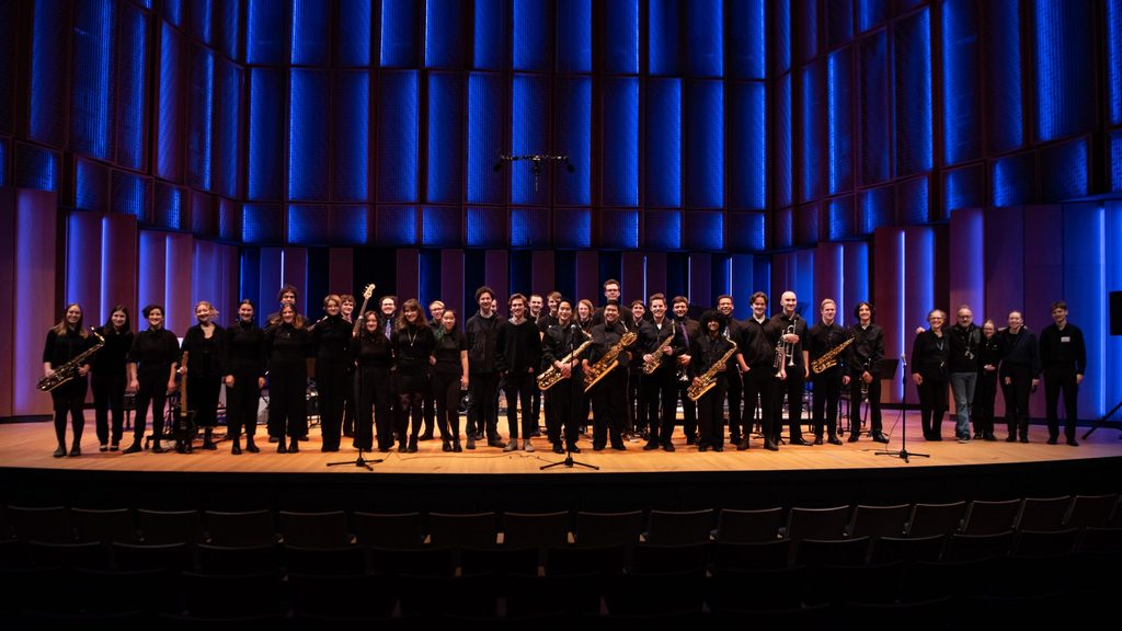 A large group of musicians on stage