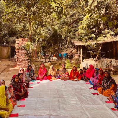 A circle of women having a meeting