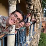 Six Carls brighten the weathered arcade of the Real Alcázar in Seville.