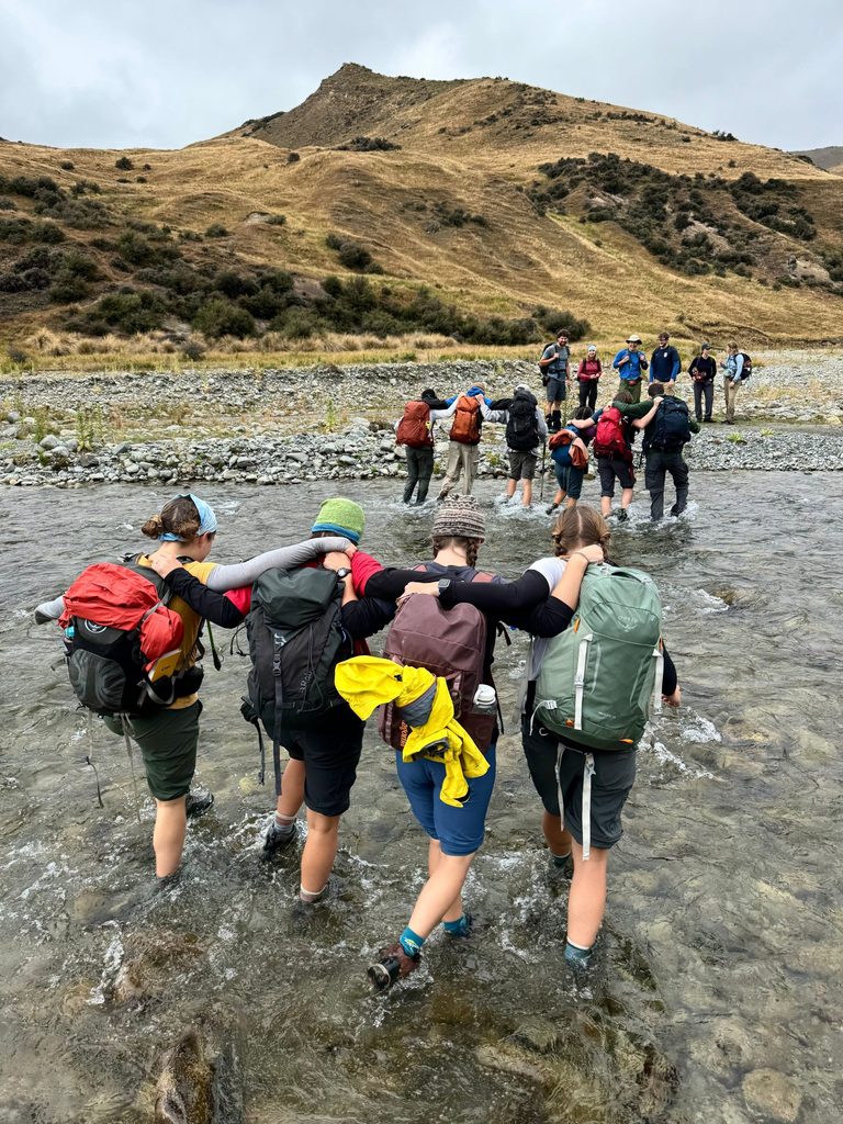 students hiking in new zealand