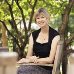 Bev Nagel sitting outdoors on a chair