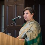 Dev Gupta speaks at a podium