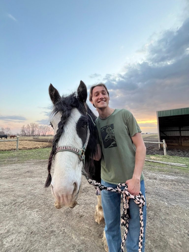 Adrián González with a horse.
