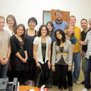 The second wave of students pose for a group photo with Dr. Trojan at his clinic.
